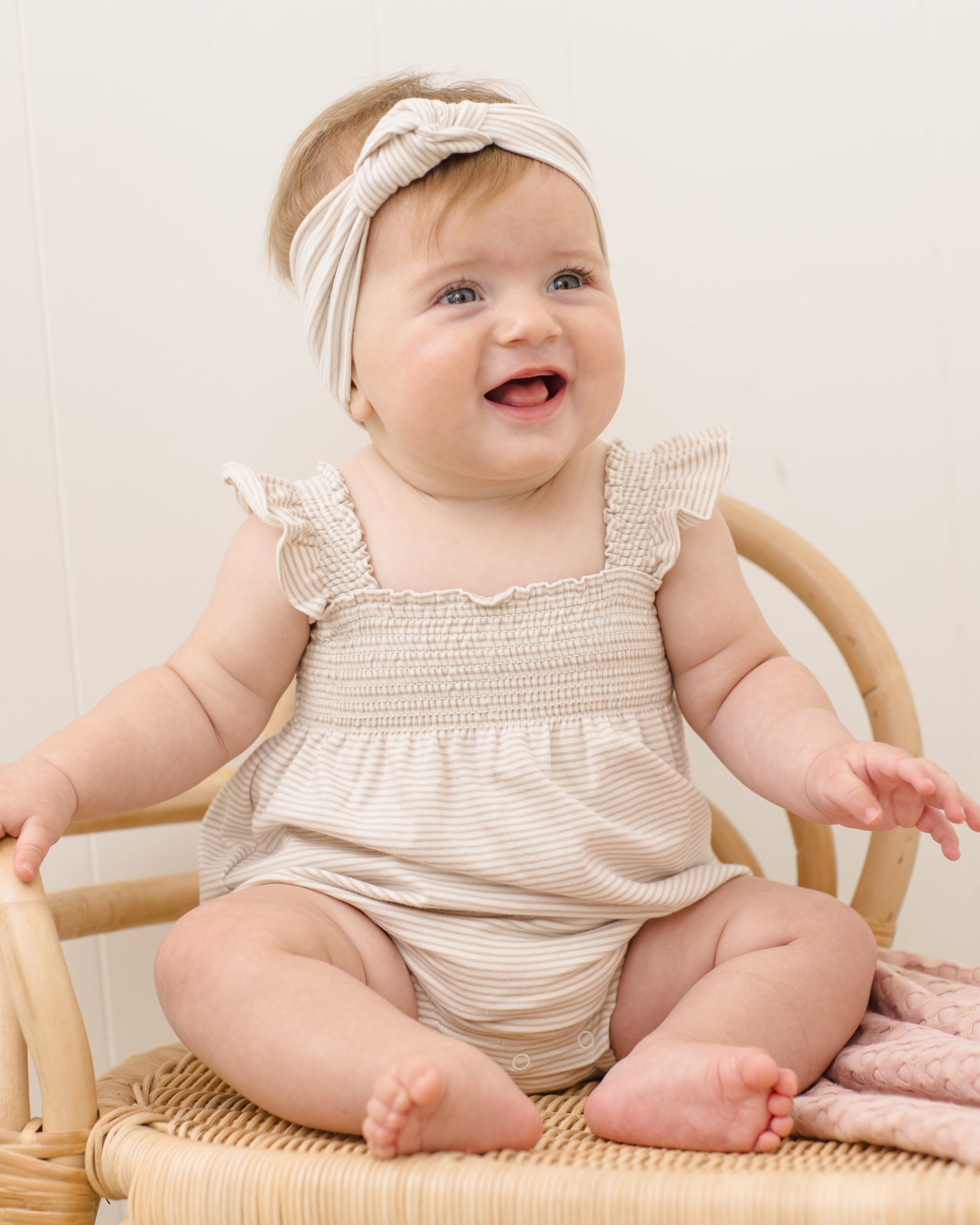 SMOCKED RUFFLE SLEEVE ROMPER OAT MICRO STRIPE