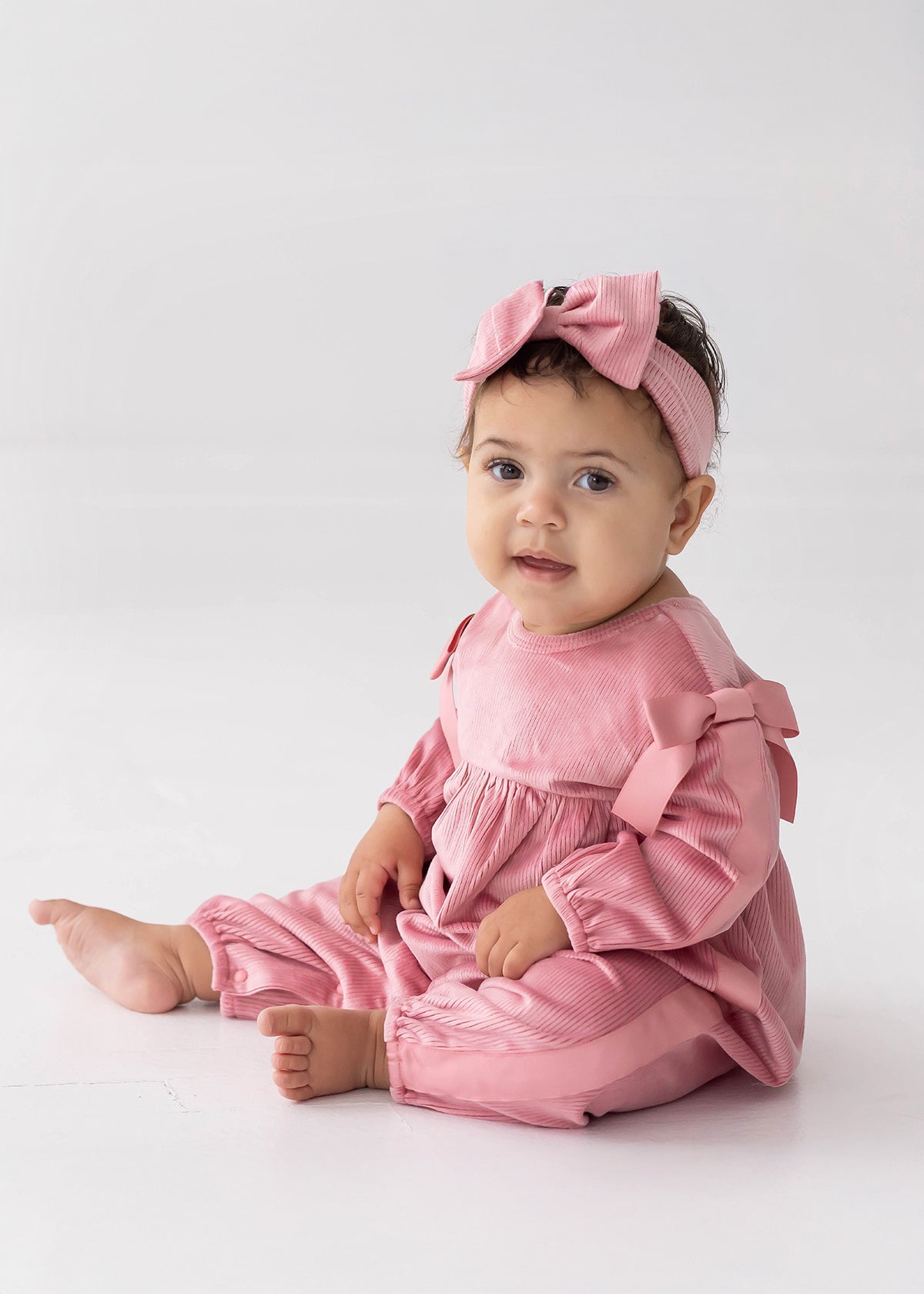 Bowtiful Blush Romper Pink